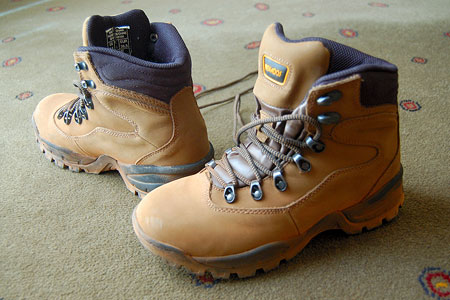 My hiking boots, covered in red dust